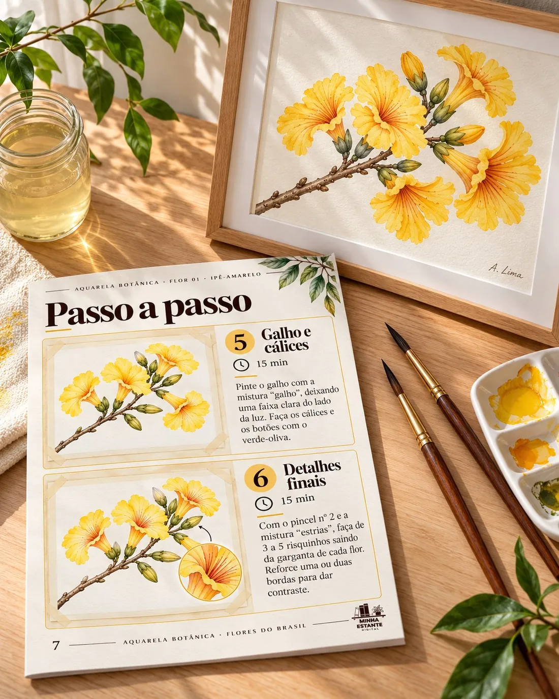 Página do ebook impressa na mesa, ao lado da pintura pronta emoldurada